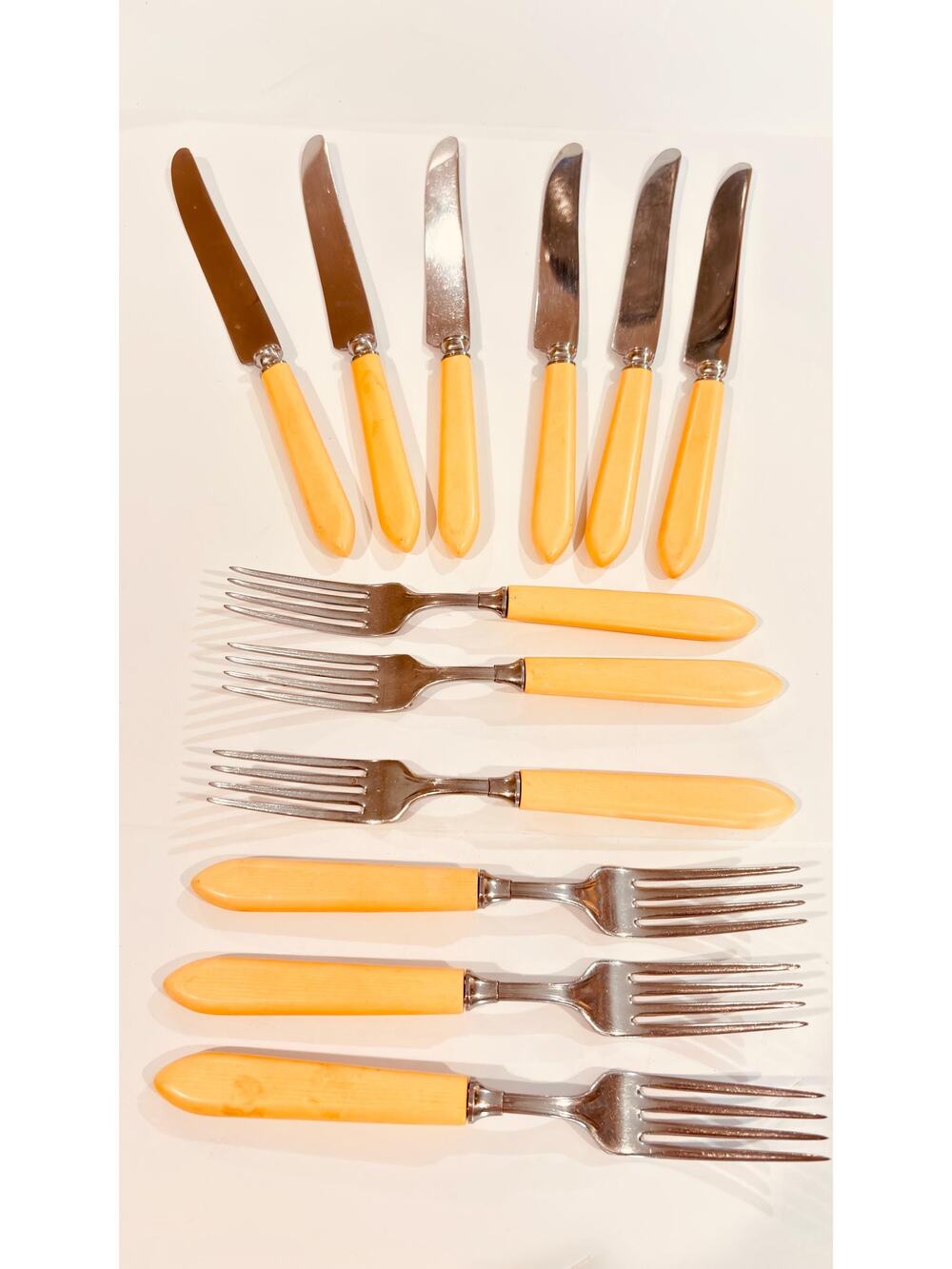 Vintage Universal Stainless Flatware Set 12 Pc Butterscotch Handle MCM Atomic